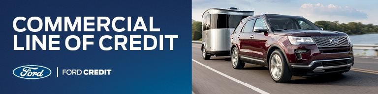 Car and Trailer on the Road