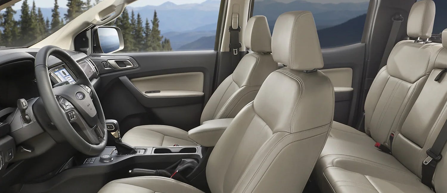 2023 Nissan Frontier towing a trailer